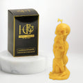 Stacked Skulls Beeswax Candle Yellow Cover Image